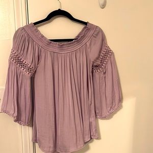 Lavender blouse. Can be worn off shoulders or on.